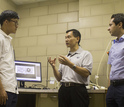 Pennsylvania State University's Ming Xiao in a discussion with graduate students.